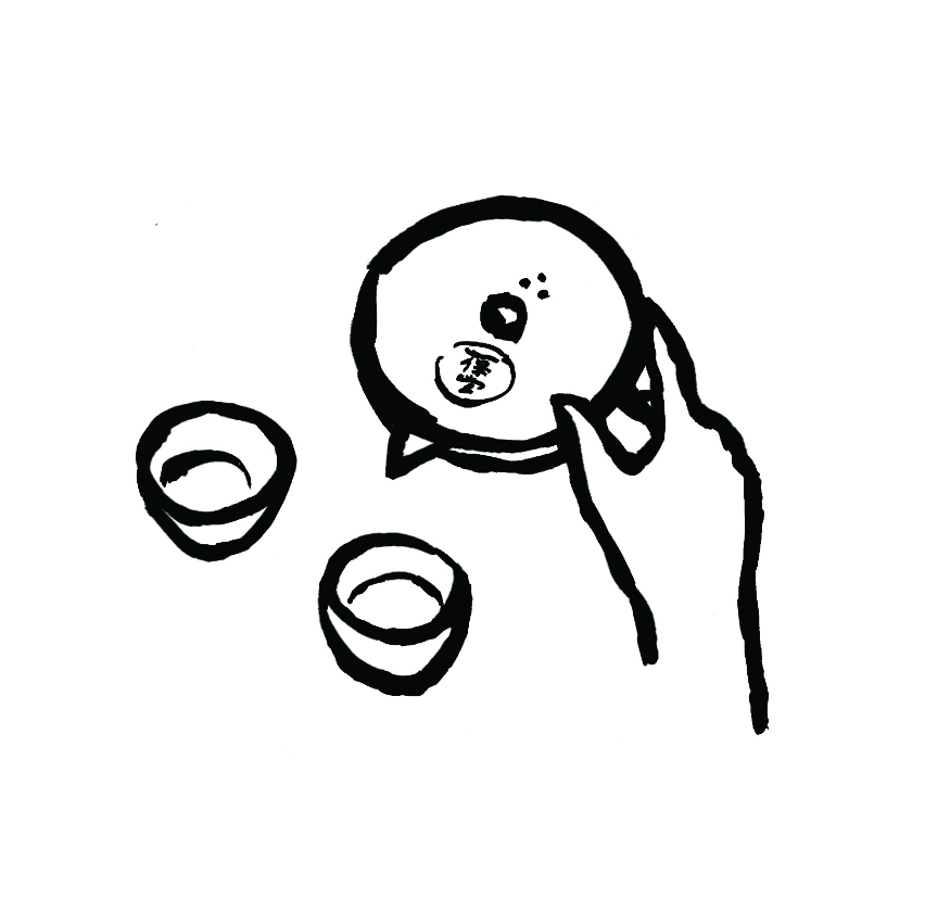 急須で湯呑みにお茶を注ぐ手元